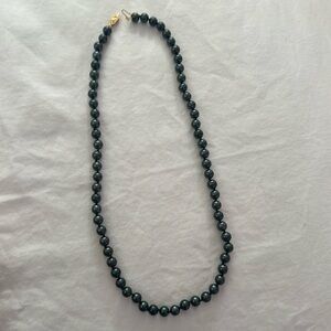 black pearl necklace with beautiful 14k gold clasp